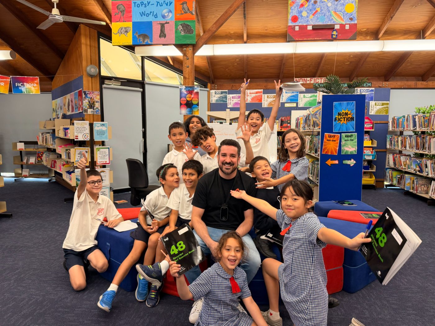 A Mighty Me group in a school library